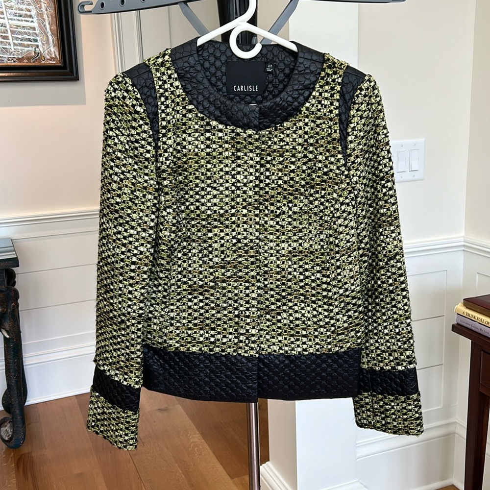 Green and black women’s blazer by Carlisle